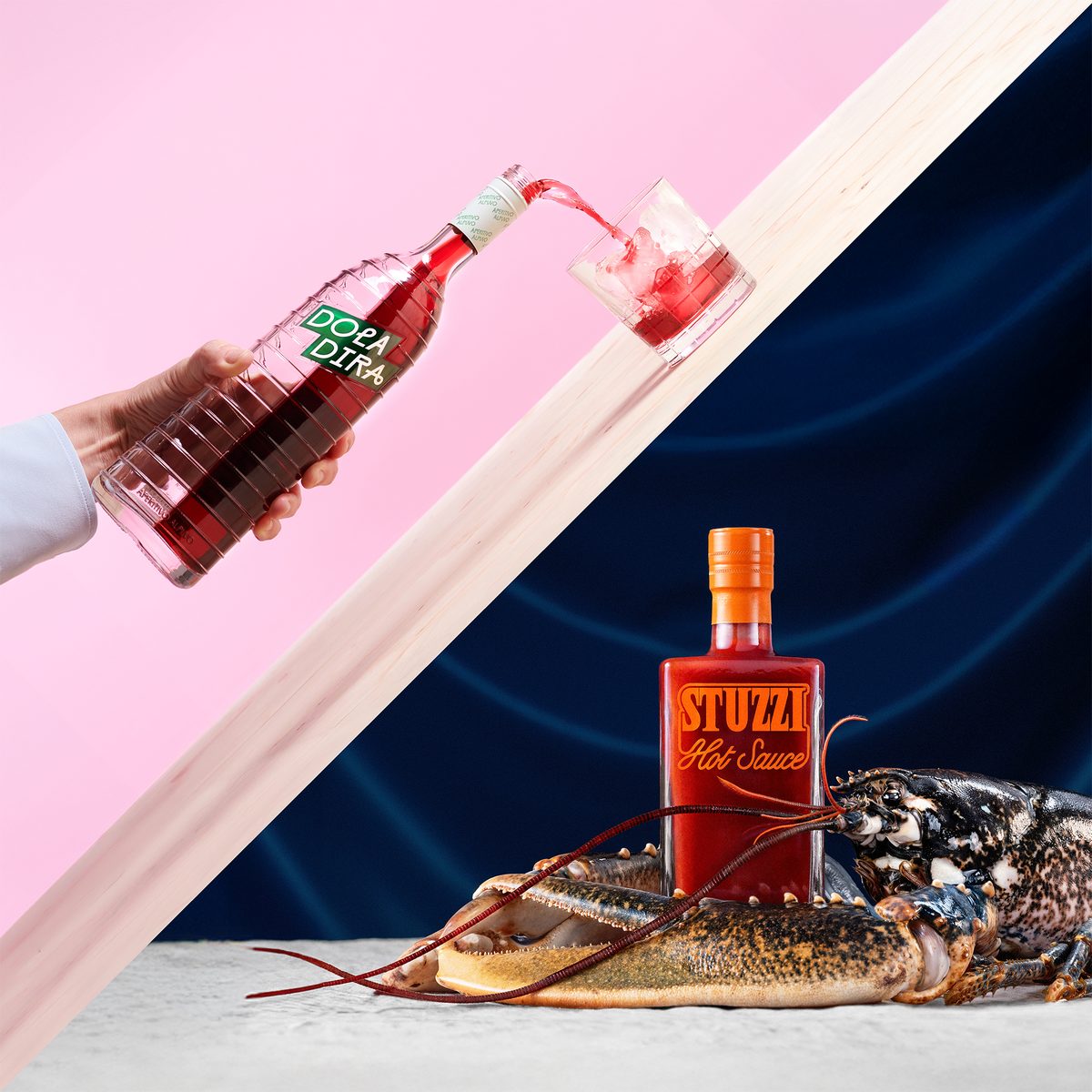 Doladira pouring and Stuzzi hot sauce with a lobster
